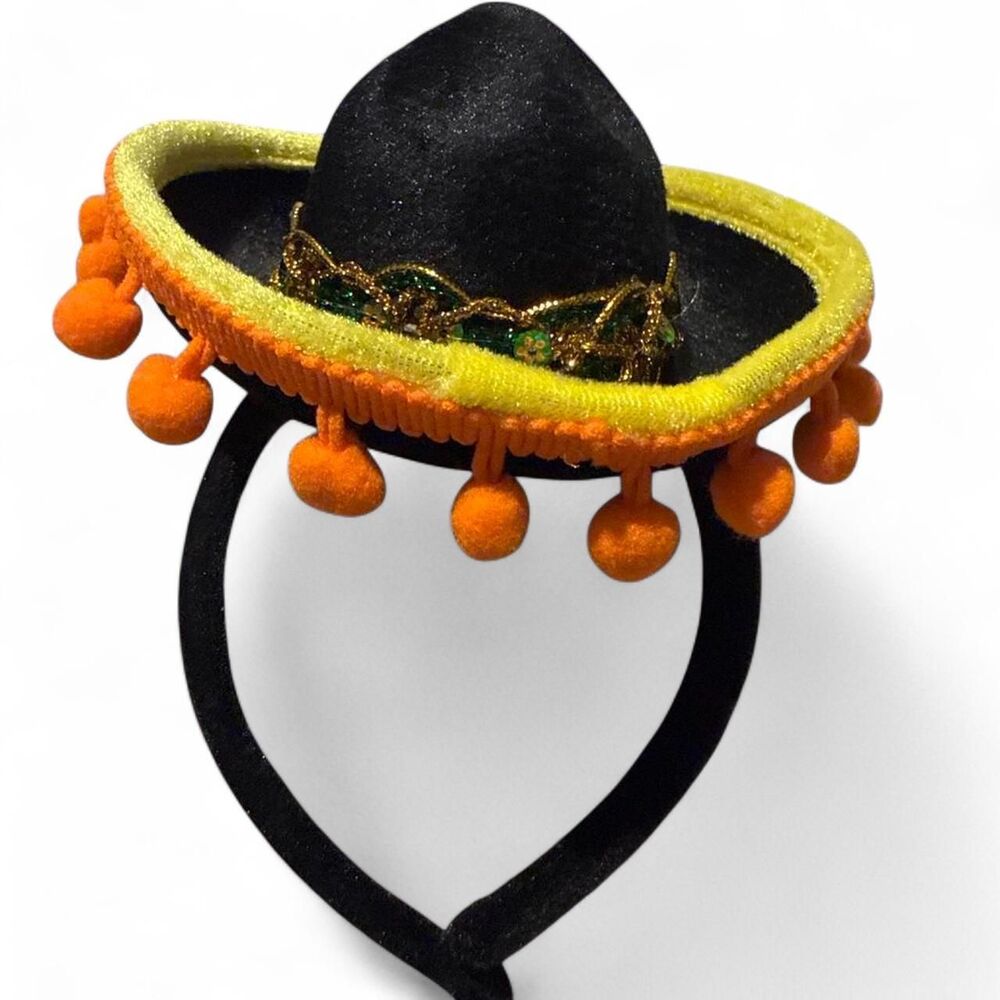 Black sombrero hat headband with orange pom poms